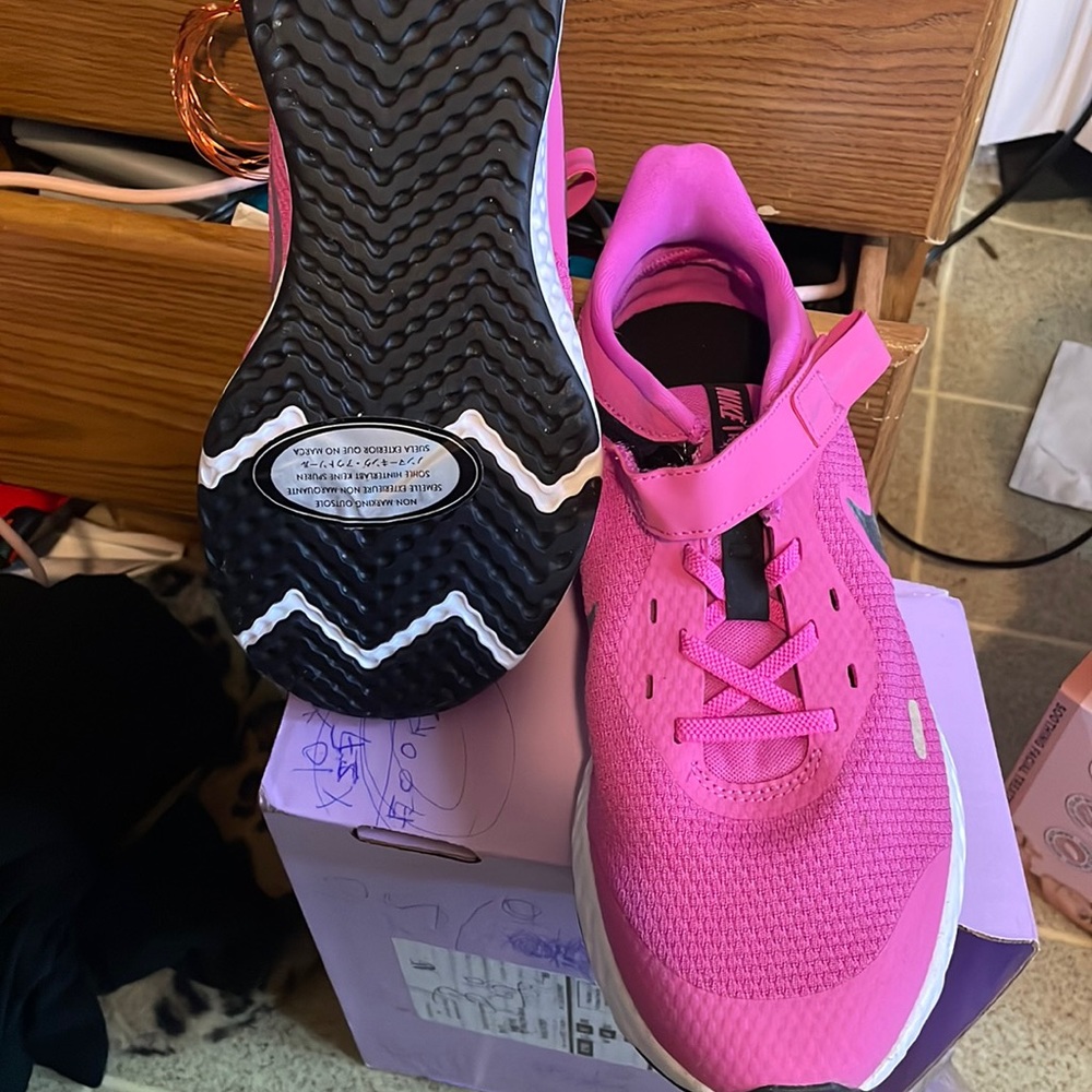 Nike revolution brand new